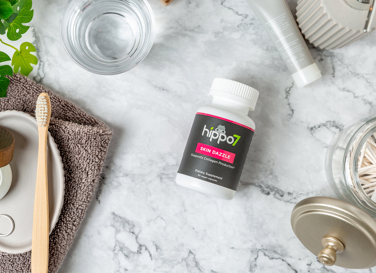 Skin Dazzle on counter with skin care products