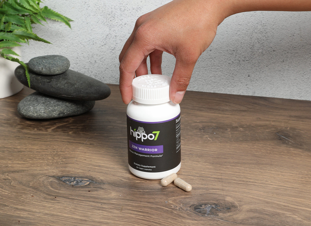 Handheld shot of Zen Warrior the stress management multivitamin from Hippo7